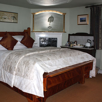 King-size Scandinavian bed in the Captain's Quarters